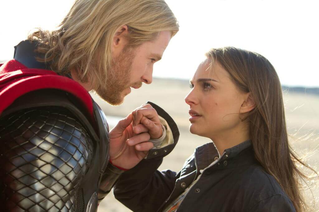 THOR Chris Hemsworth as Thor Natalie Portman as Jane Foster almost kiss